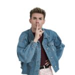 Young caucasian man doing the sign of silence, isolated.